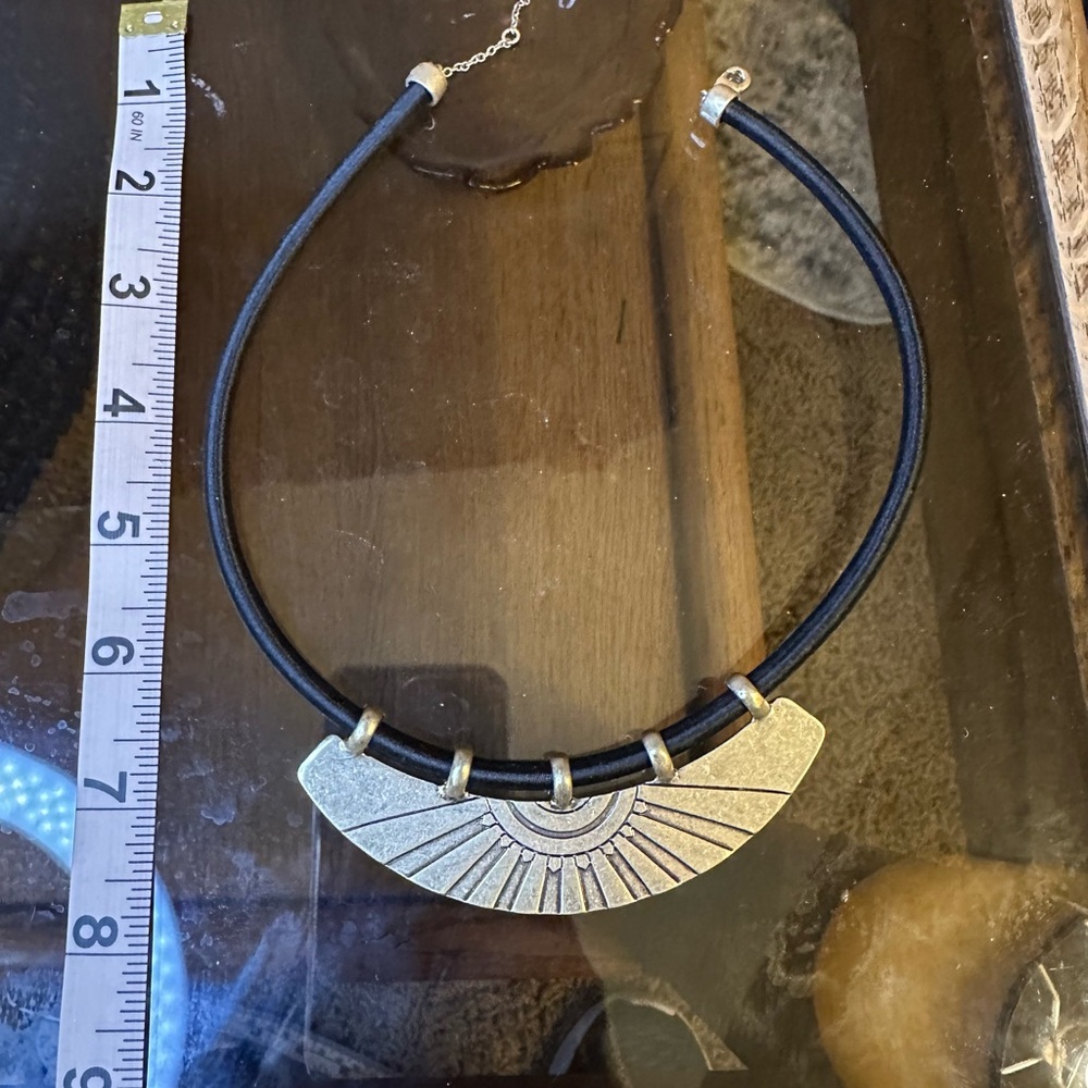 Gold and Black Necklace with Sun design